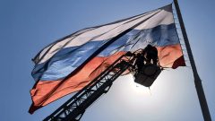 На площади Ленина в Туле обновили Государственный флаг России. 